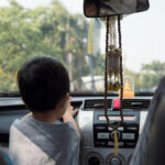 How old do you have to be to sit in the front seat?